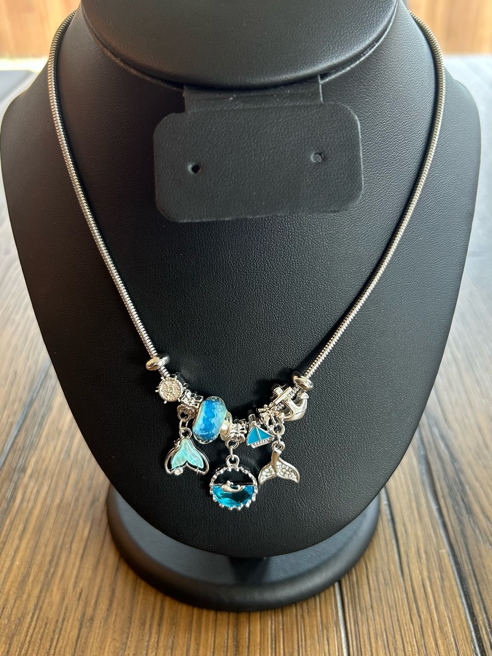 Brand New Silver Necklace with Blue Ocean Charms